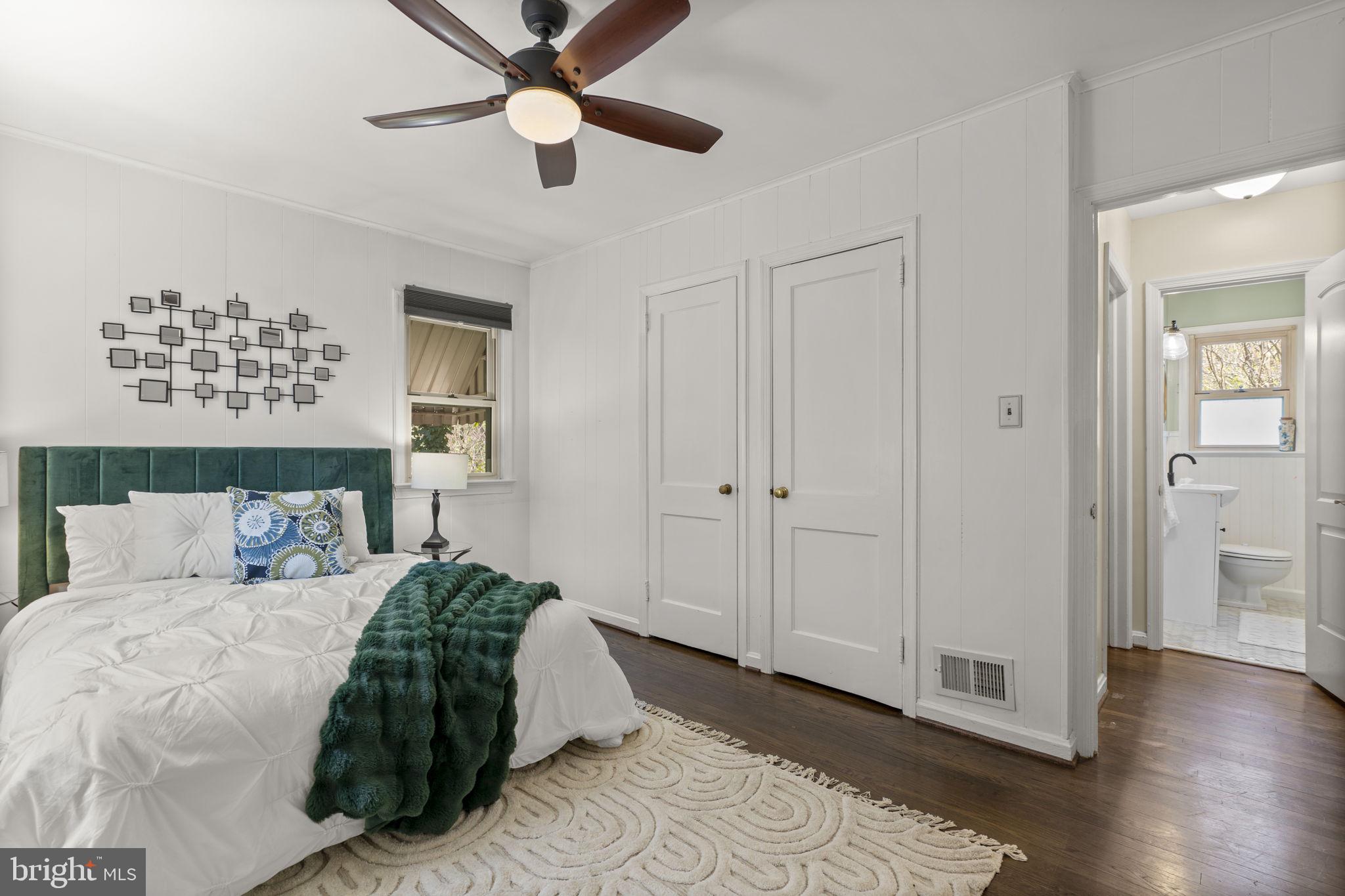 7005 Grove Road Alexandria, VA 22306 - Photo 29 of 52 a bedroom with a bed and a window