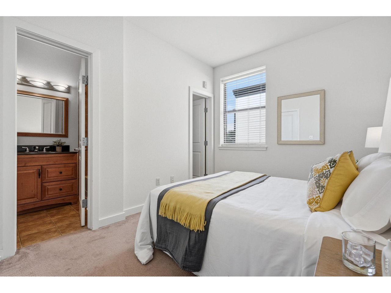 4645 Broadway, Unit C3 Boulder, CO 80304 - Photo 13 of 40 Large primary bedroom with ensuite full bath and walk in closet.