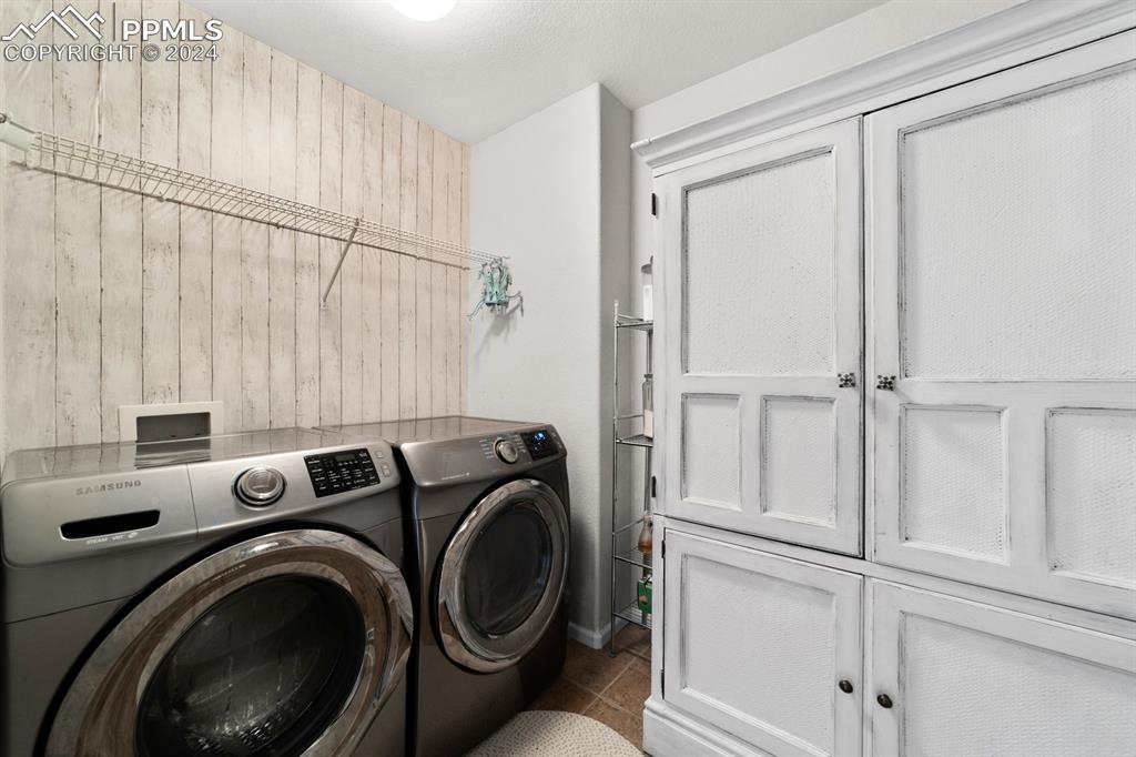 7375 Sandy Springs Point Fountain, CO 80817 - Photo 15 of 31 a utility room with dryer and washer