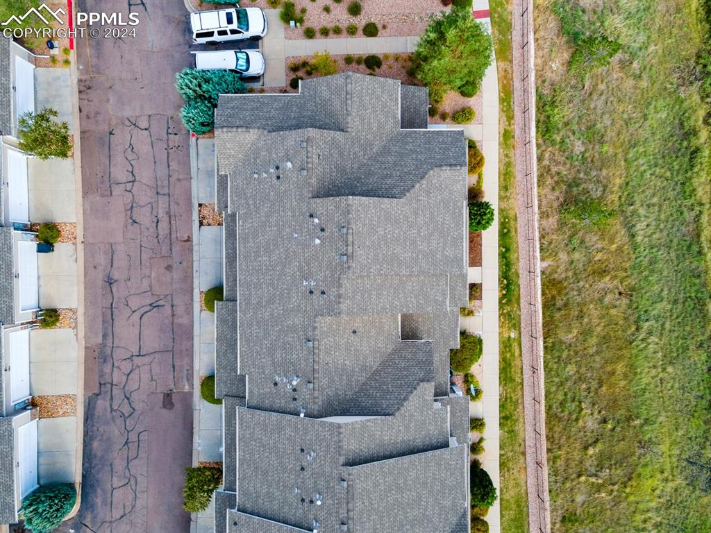 7375 Sandy Springs Point Fountain, CO 80817 - Photo 7 of 31 aerial view of a house with a garden and statue