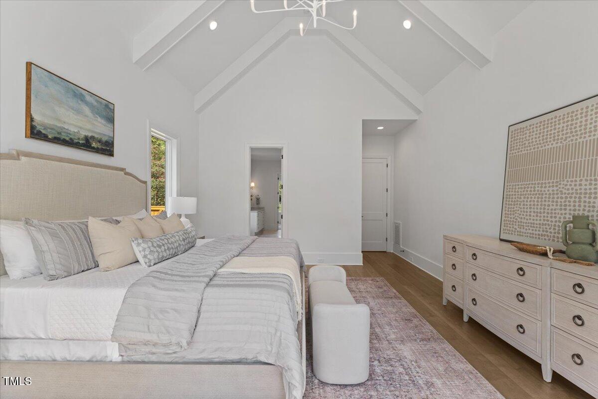 6844 Greystone Drive Raleigh, NC 27615 - Photo 33 of 83 a bed room with a bed and a chair