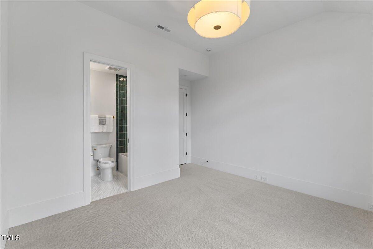 6844 Greystone Drive Raleigh, NC 27615 - Photo 58 of 83 an empty room with a empty space and a sink