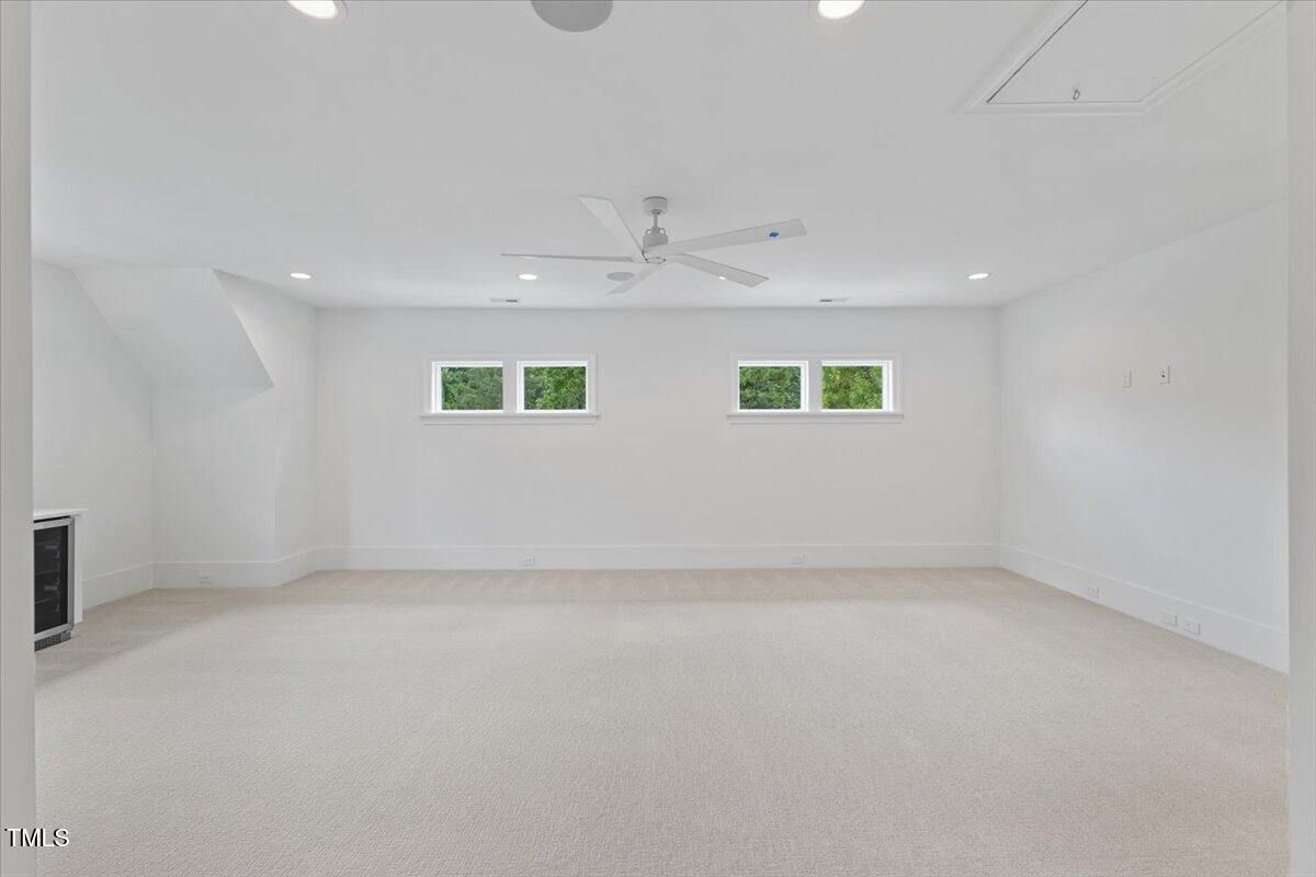 6844 Greystone Drive Raleigh, NC 27615 - Photo 67 of 83 an empty room with windows