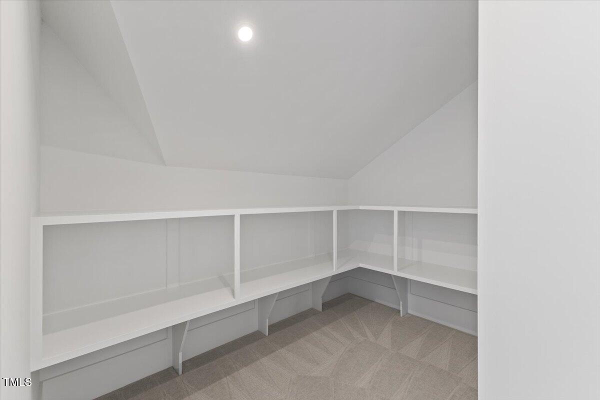 6844 Greystone Drive Raleigh, NC 27615 - Photo 71 of 83 a view of an empty walk in closet