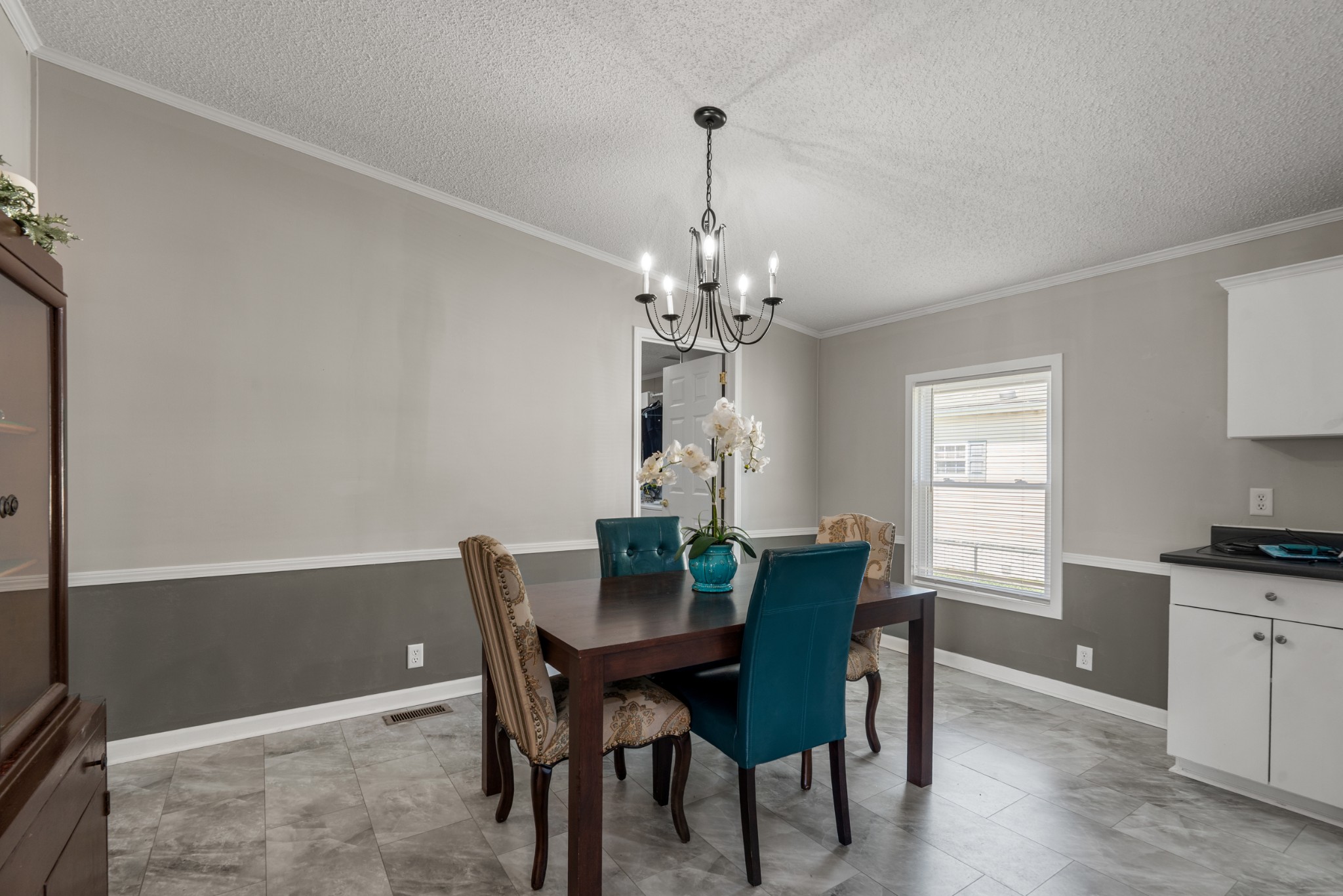 129 Broken Arrow Paris, TN 38242 - Photo 13 of 49 a view of a dining room with furniture and window