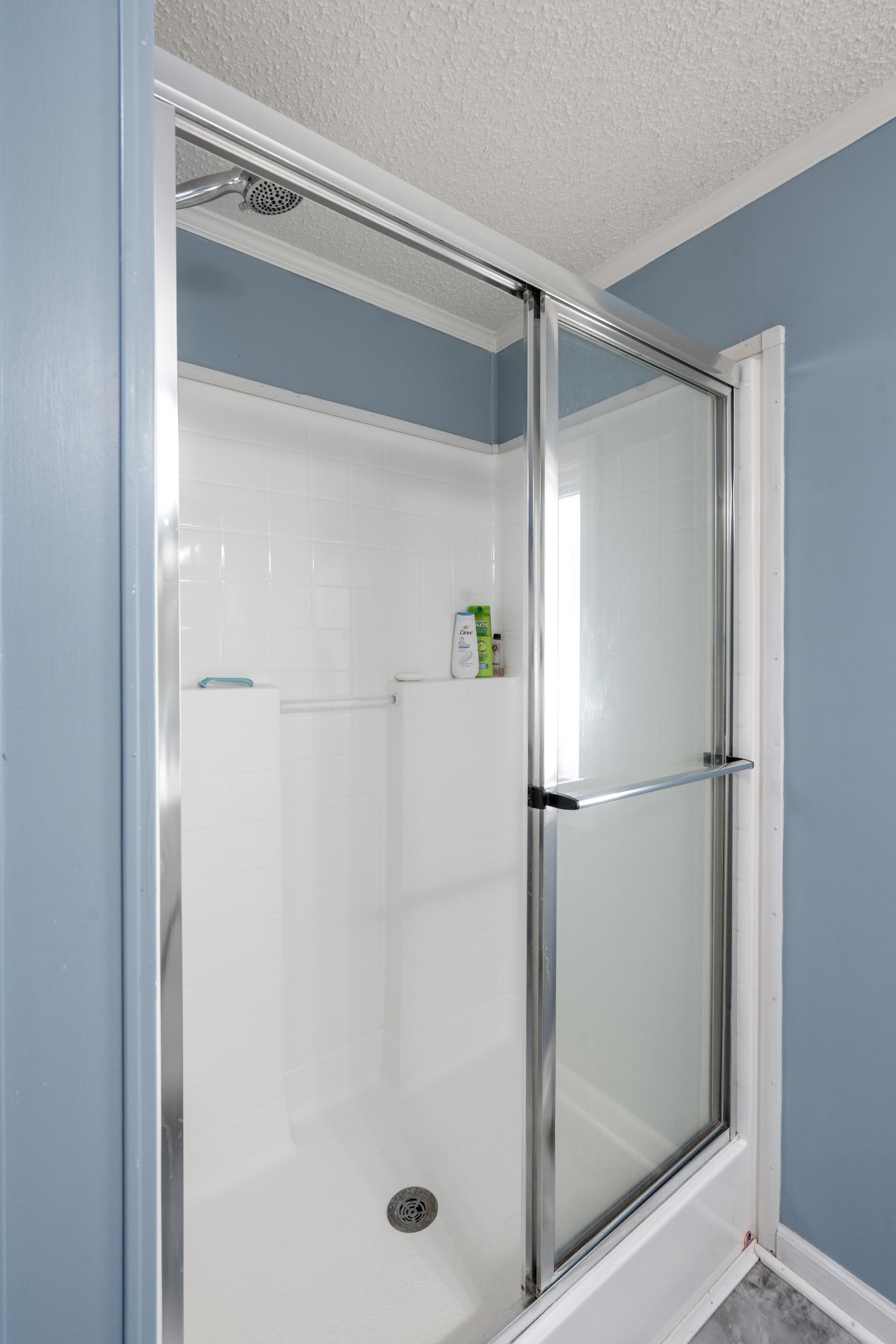 129 Broken Arrow Paris, TN 38242 - Photo 23 of 49 a bathroom with a glass shower door