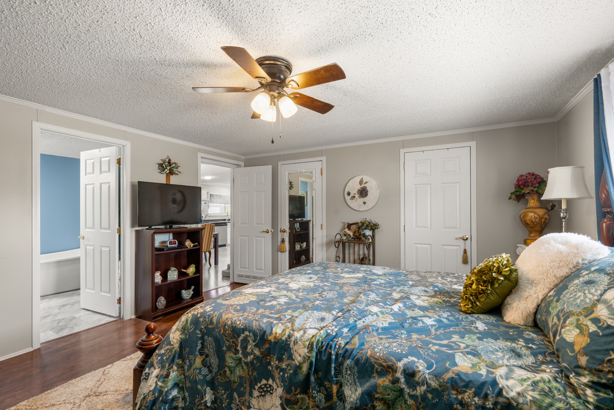 129 Broken Arrow Paris, TN 38242 - Photo 27 of 49 a bedroom with a bed and a flat screen tv