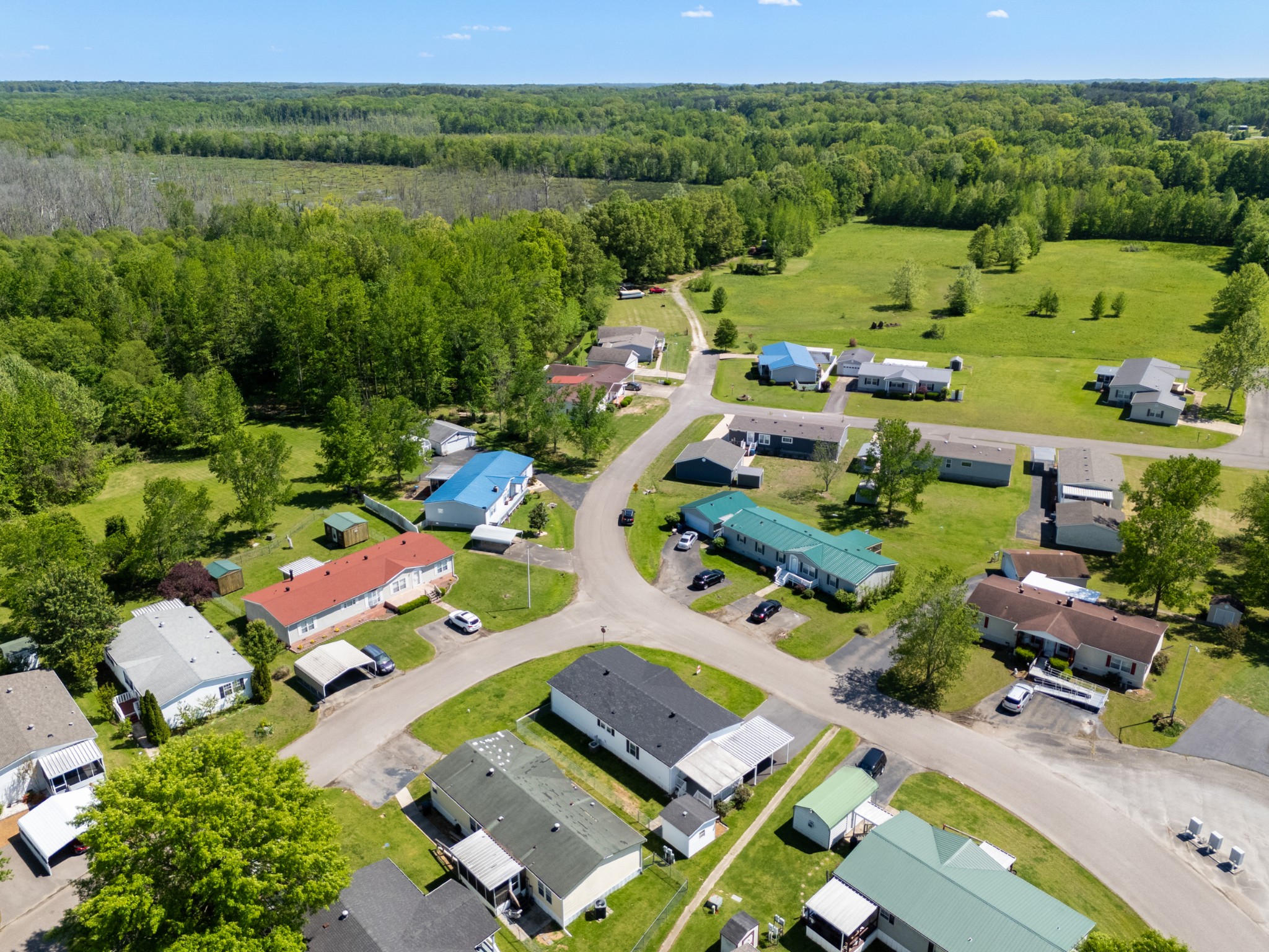 129 Broken Arrow Paris, TN 38242 - Photo 42 of 49 an aerial view of a house with a garden