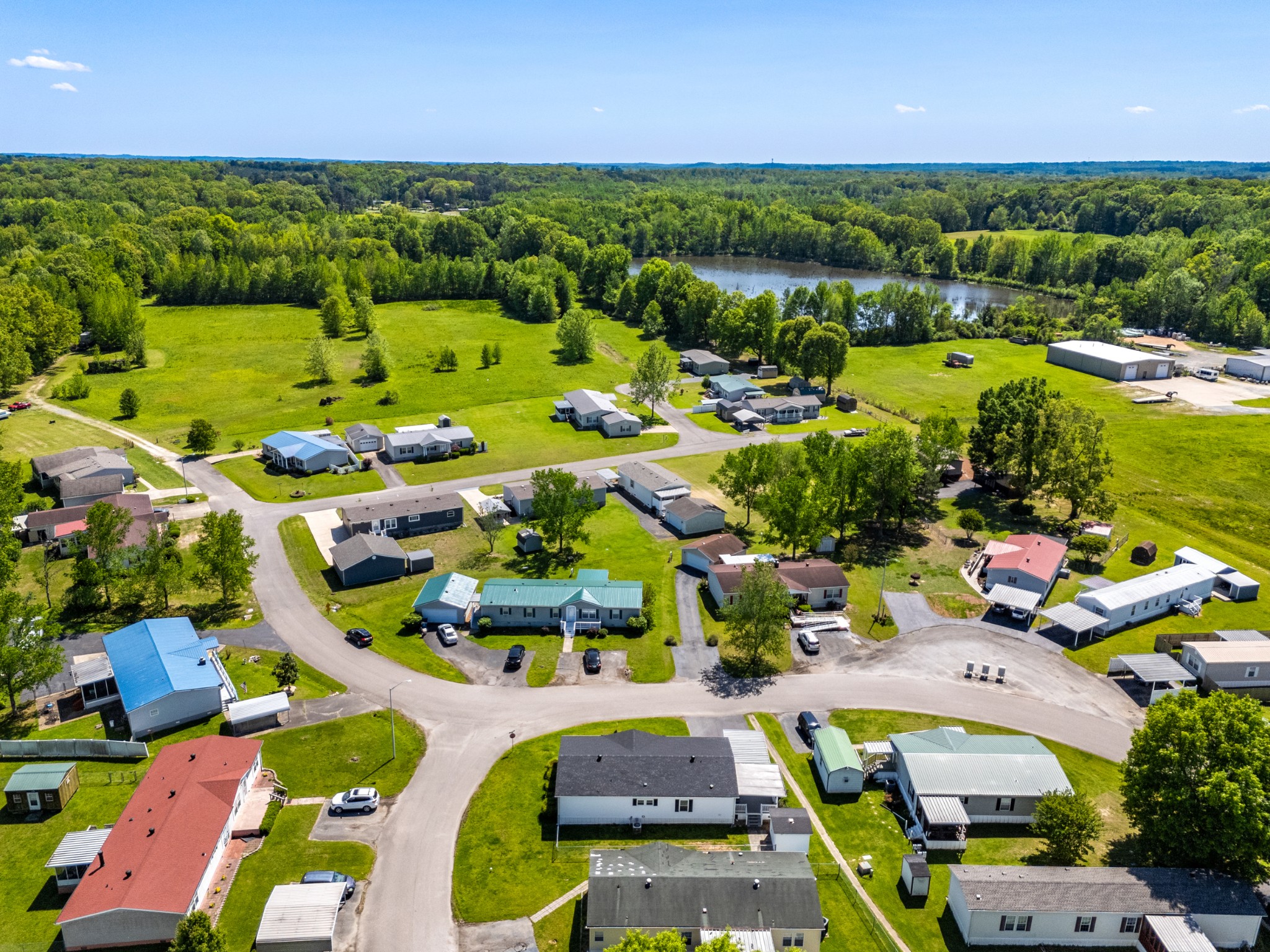 129 Broken Arrow Paris, TN 38242 - Photo 46 of 49 an aerial view of a houses with outdoor space