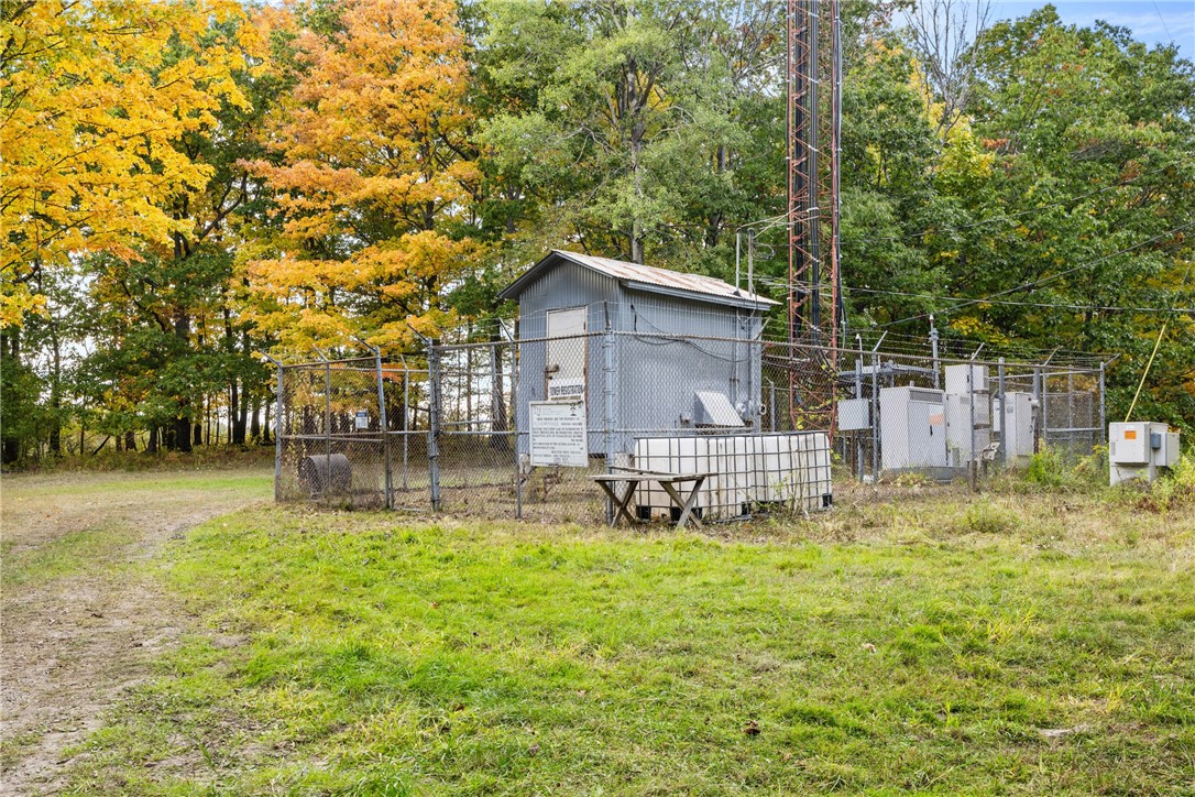 1910 Brush Road Hartsville, NY 14843 - Photo 18 of 30 The fenced area and tower are maintained by the cu