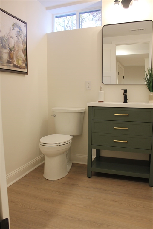 30 Maple Street Hudson, MA 01749 - Photo 30 of 36 a bathroom with a toilet and a sink