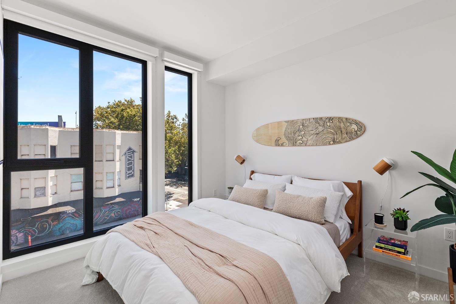 988 Harrison Street, Unit HL4 San Francisco, CA 94107 - Photo 7 of 10 a bedroom with a large bed and a large window