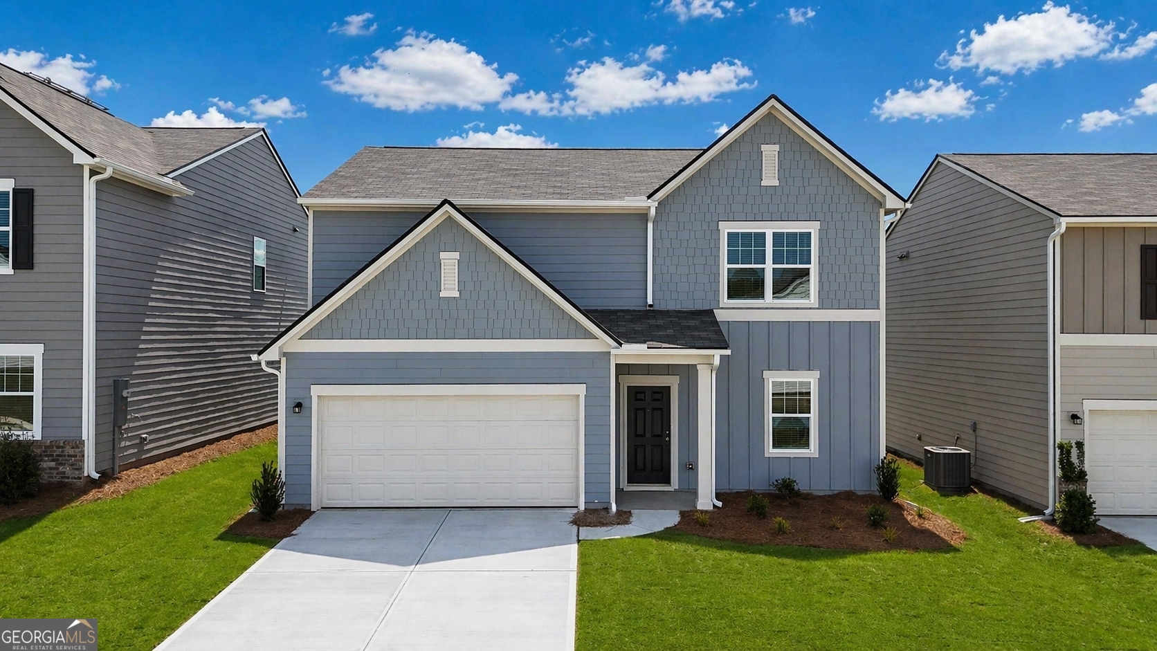 116 Otway Loop Winder, GA 30680 - Photo 1 of 16 a front view of a house with a yard and garage