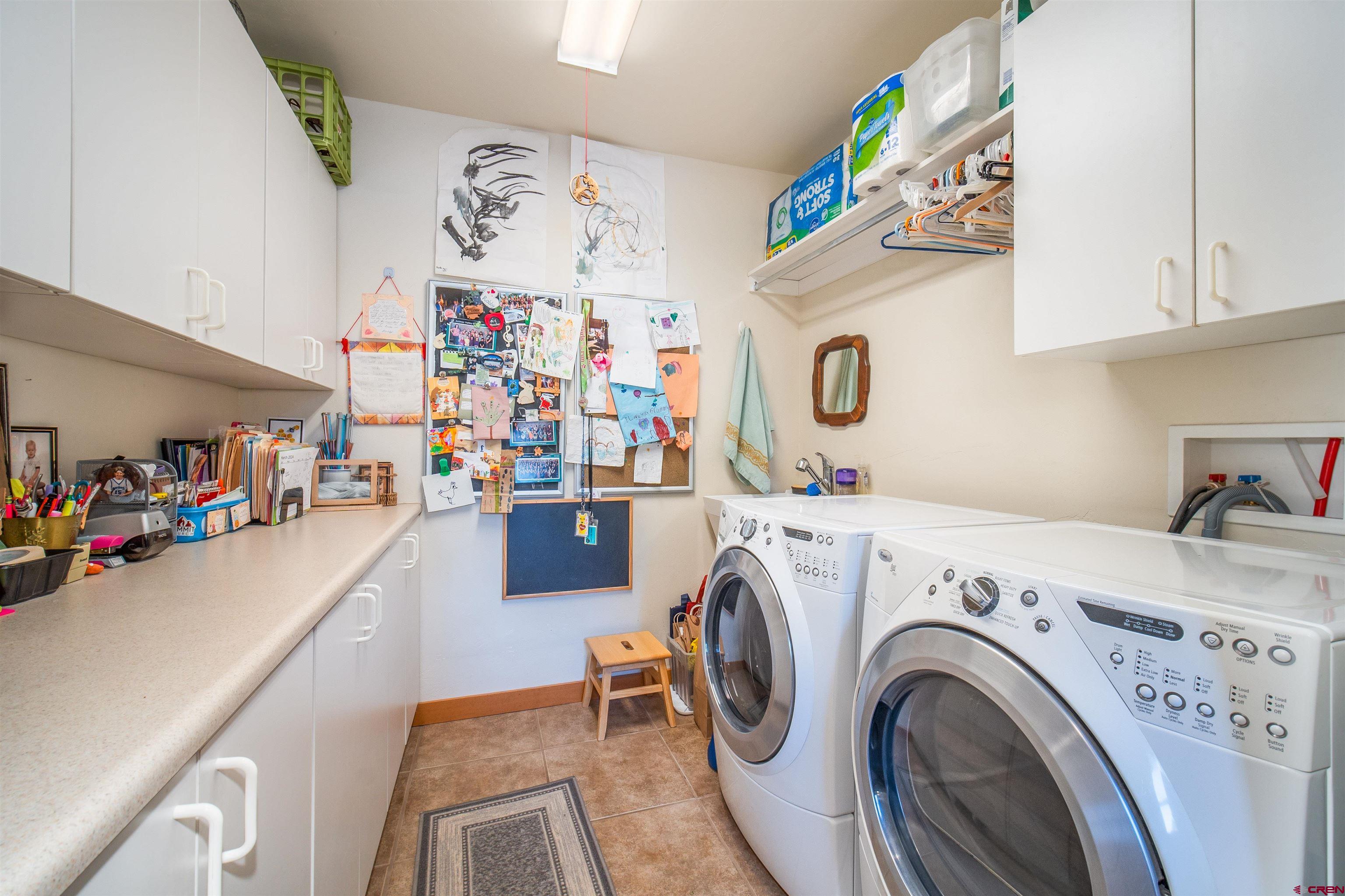 25 Red Table Court Durango, CO 81301 - Photo 23 of 34 a view of livingroom with washer and dryer
