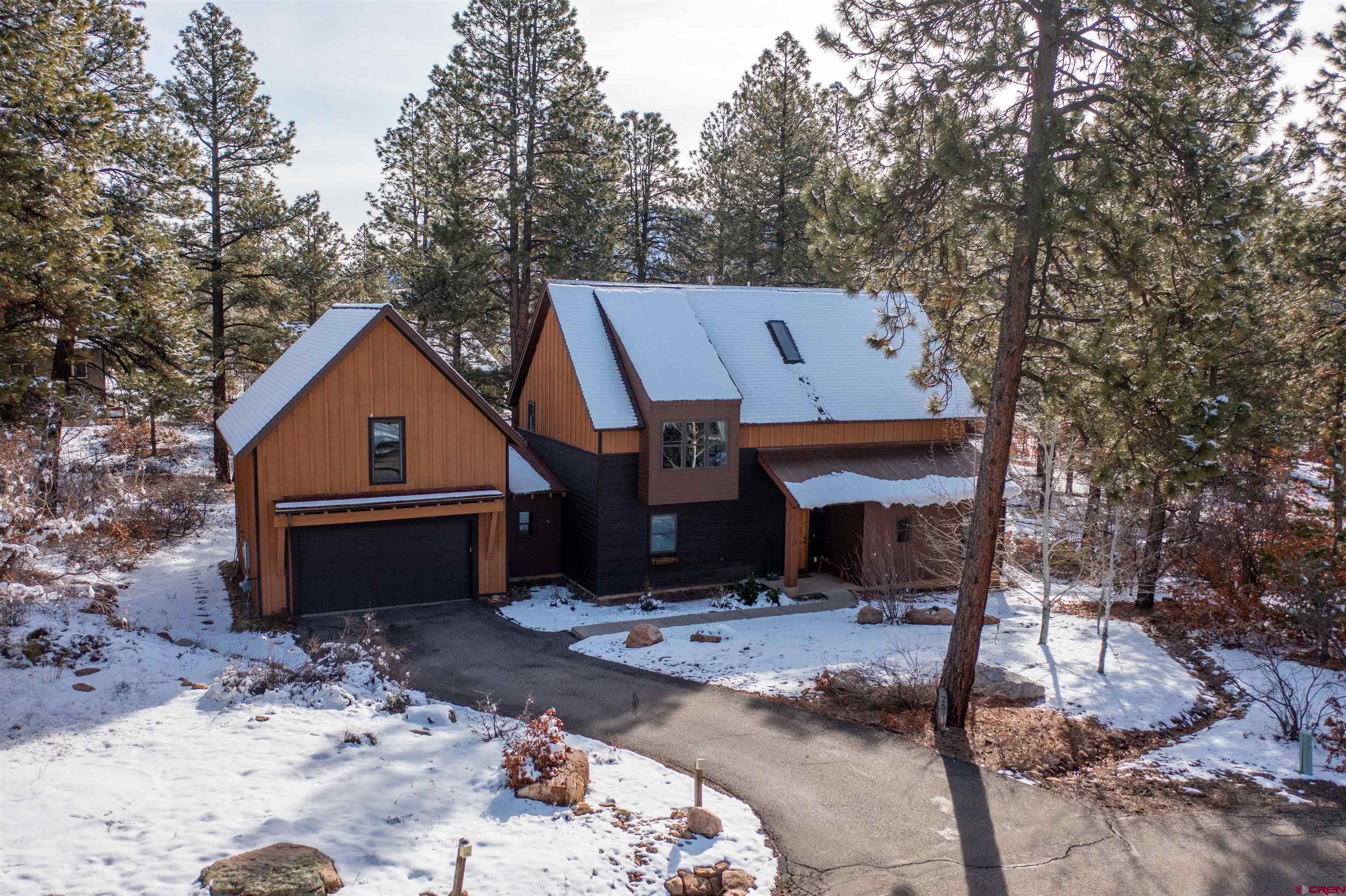 25 Red Table Court Durango, CO 81301 - Photo 25 of 34 a view of a house with backyard and sitting area