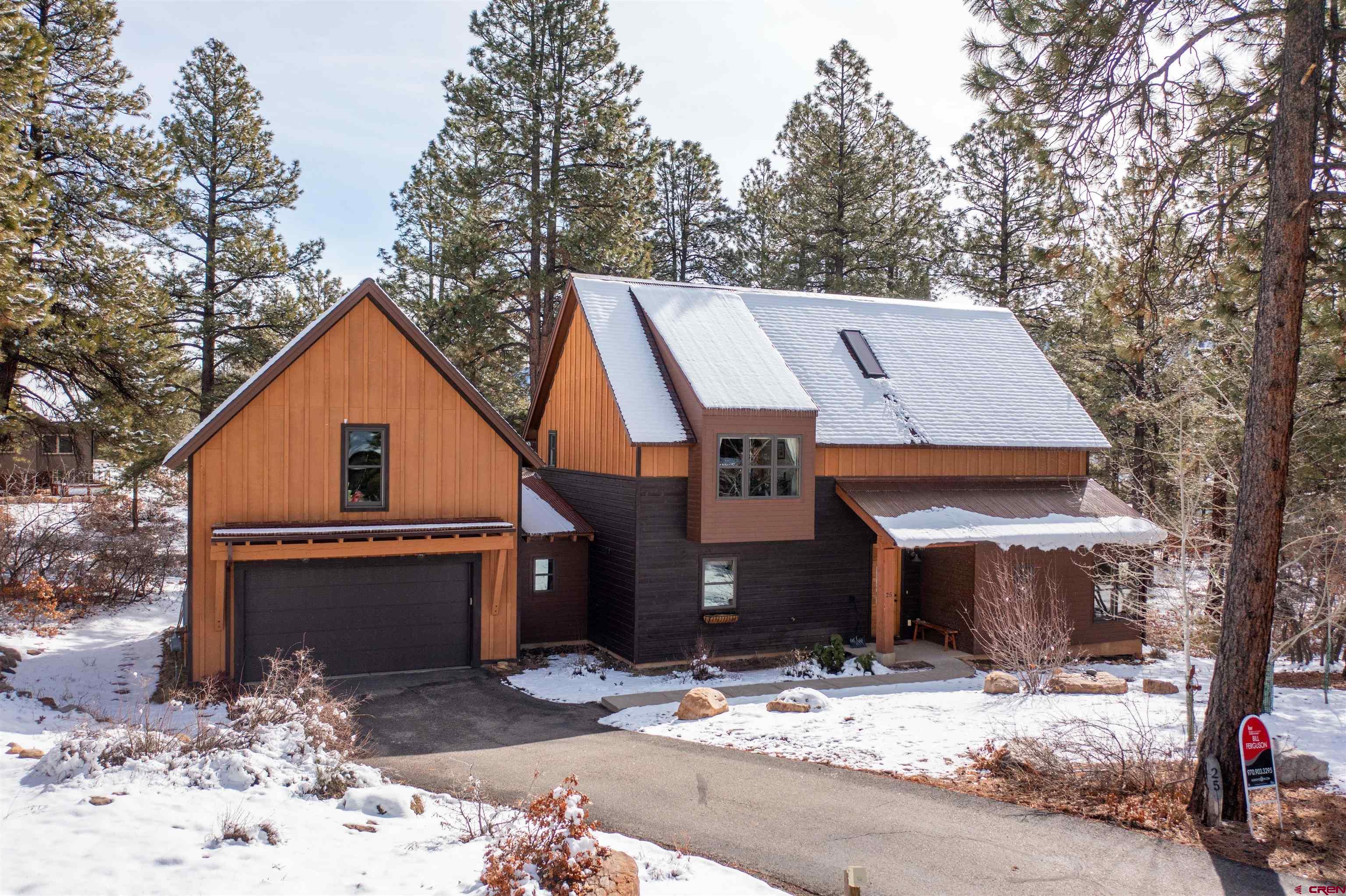 25 Red Table Court Durango, CO 81301 - Photo 32 of 34 a front view of a house with trees