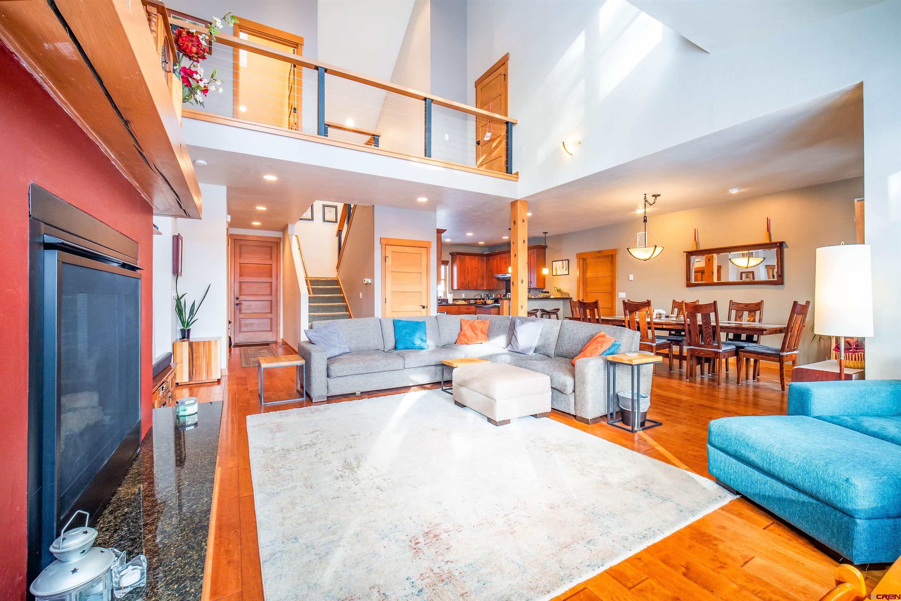 25 Red Table Court Durango, CO 81301 - Photo 4 of 34 a living room with furniture a dining table and chairs in it