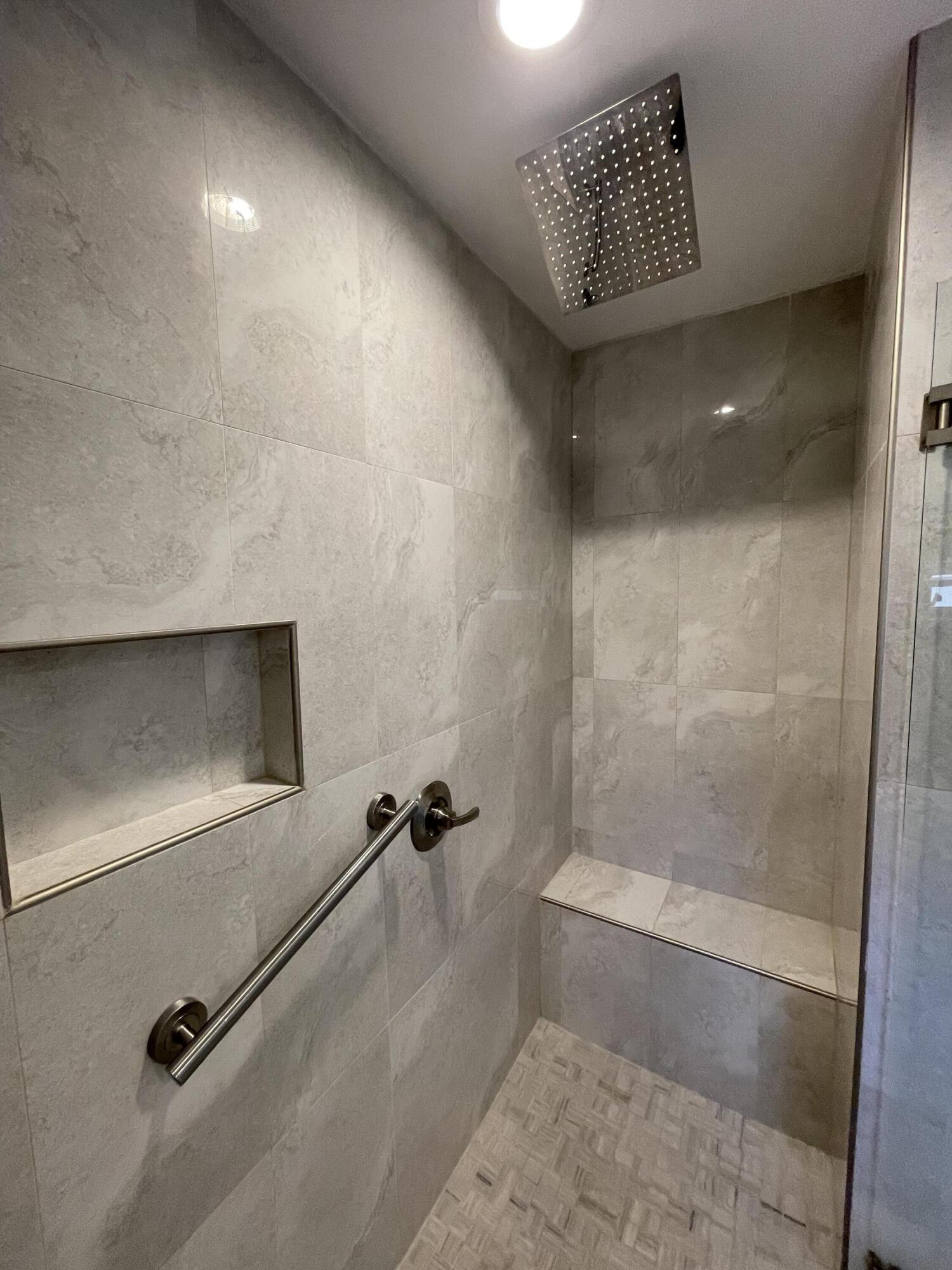 6157 Sunny Pointe Circle Delray Beach, FL 33484 - Photo 16 of 64 a bathroom with a shower