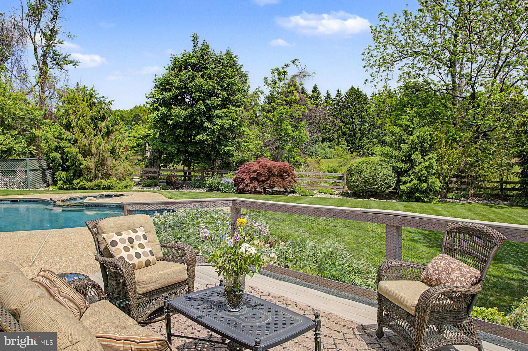 4009 Smoke Road Doylestown, PA 18902 - Photo 45 of 52 a balcony with wooden floor and outdoor seating