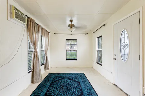 a view of a tree in front of house