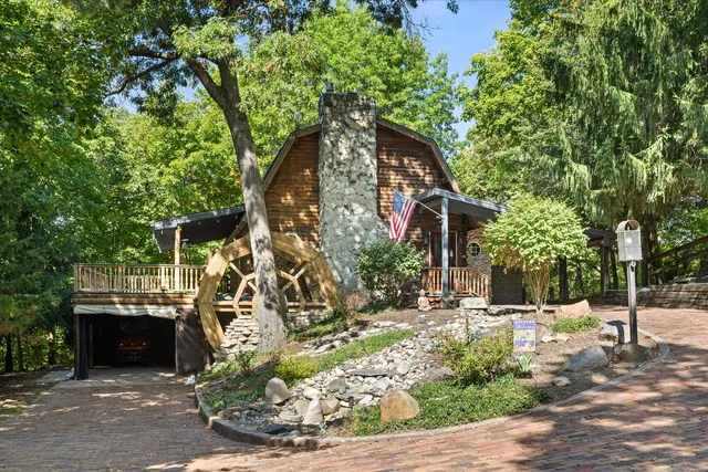 a backyard of a house with lots of green space