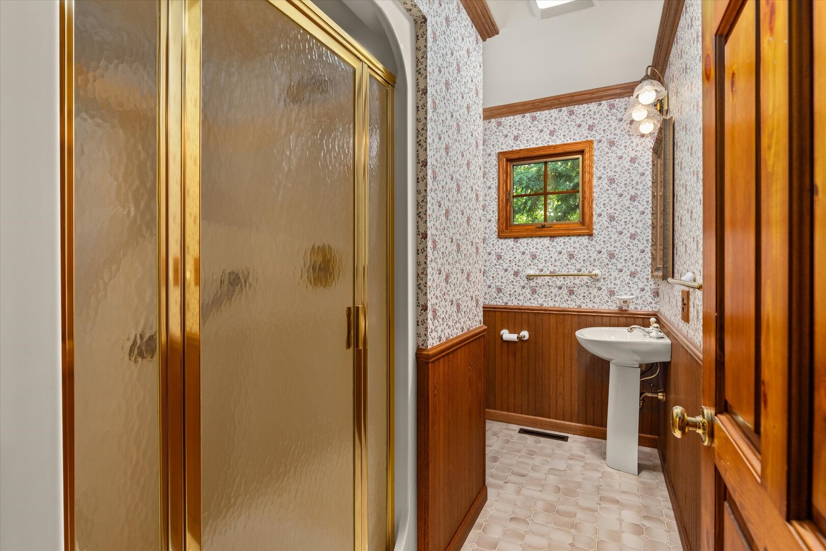 910 Durant Street Oglesby, IL 61348 - Photo 23 of 52 a bathroom with a sink a toilet and shower