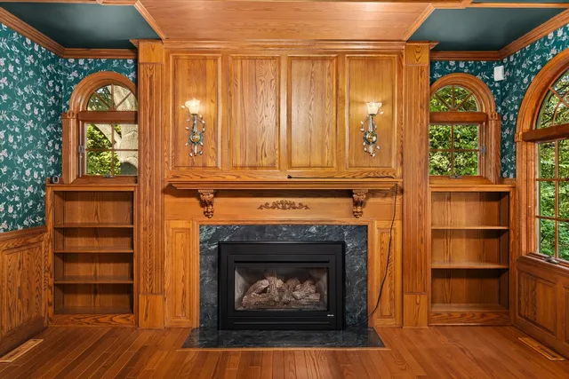a view of a bedroom with a large bed and a large window