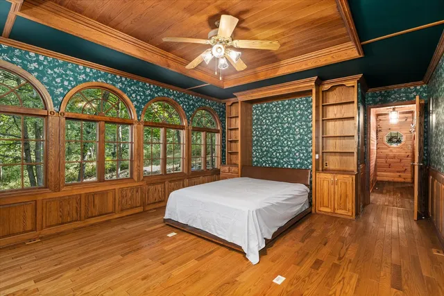 a view of balcony with wooden floor