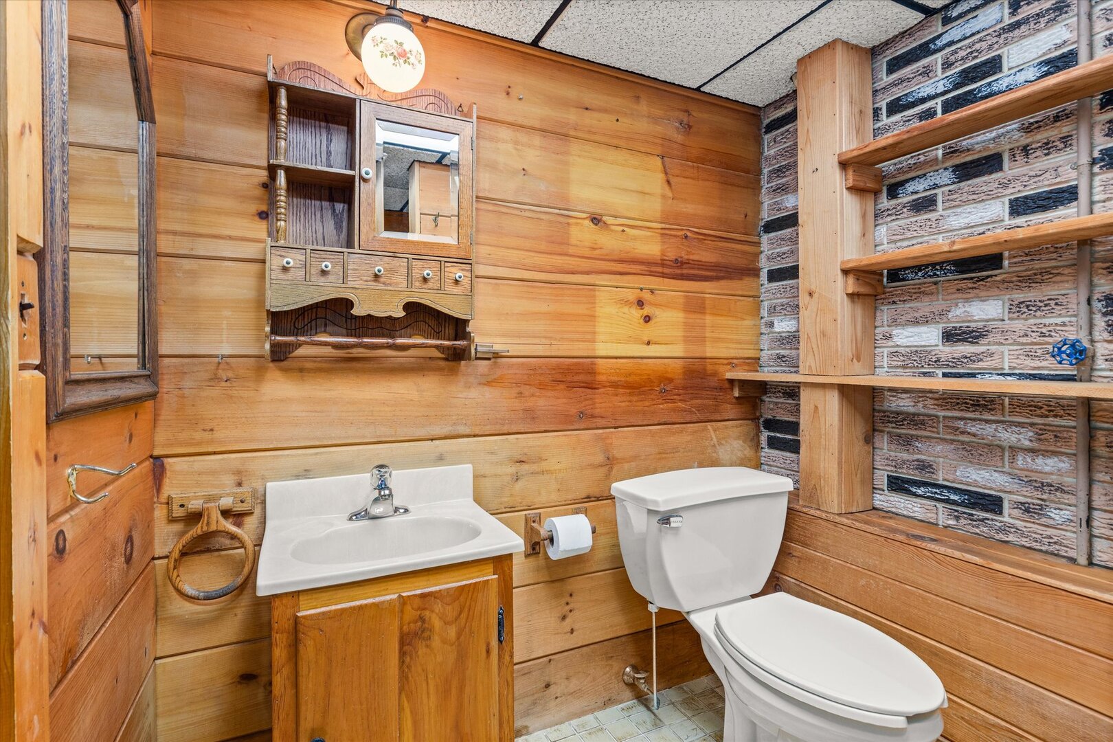 910 Durant Street Oglesby, IL 61348 - Photo 39 of 52 a bathroom with a toilet sink and mirror