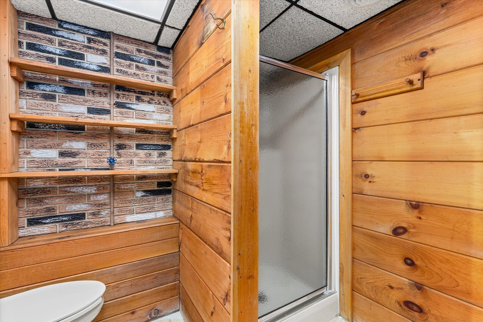 910 Durant Street Oglesby, IL 61348 - Photo 40 of 52 a bathroom with a shower and mirror