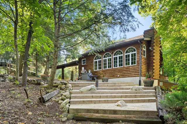 a view of a two chairs in the deck