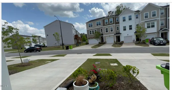 a front view of a building with street view