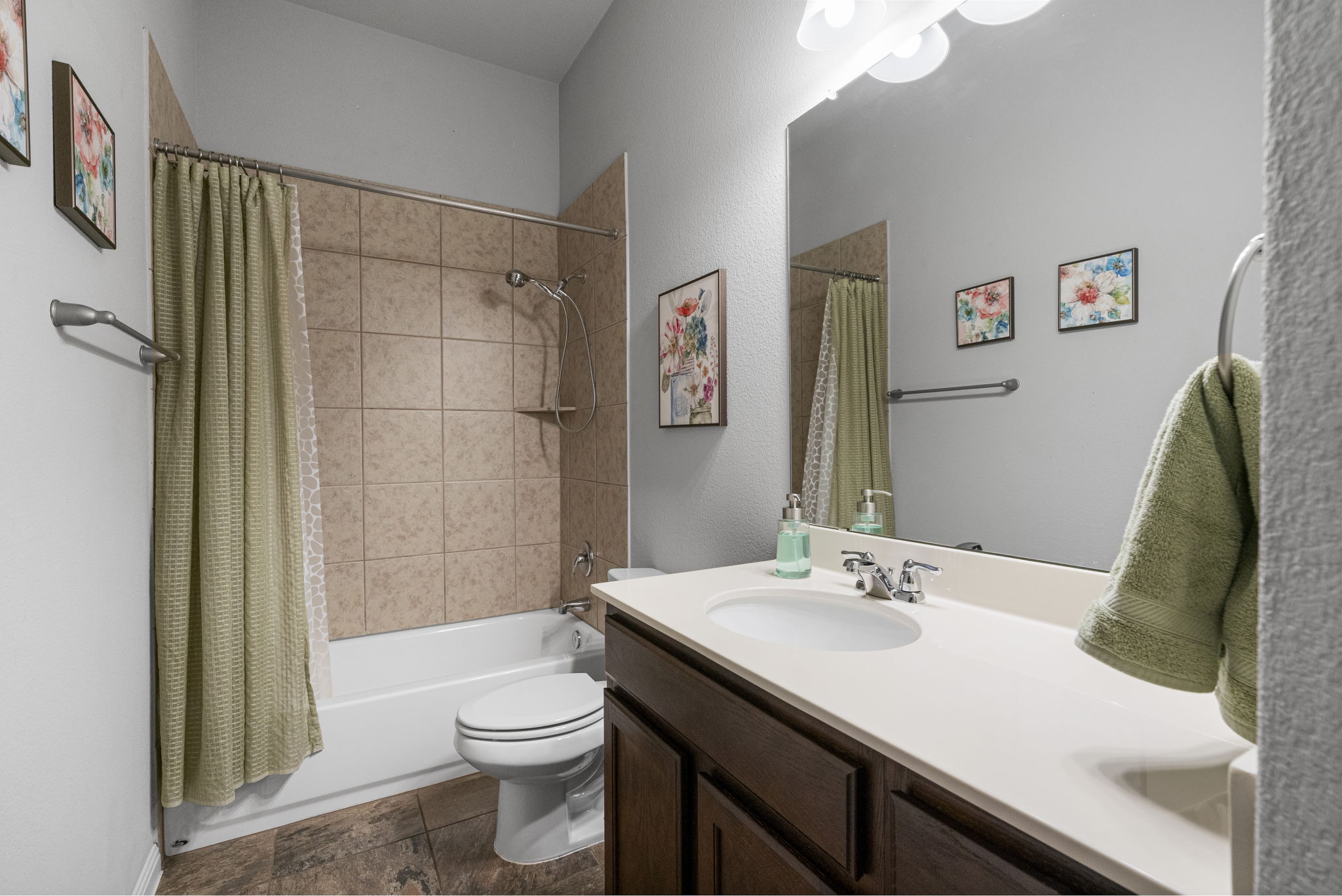 2009 Kates Cove Manchaca, TX 78652 - Photo 14 of 25 a bathroom with a sink a toilet and shower