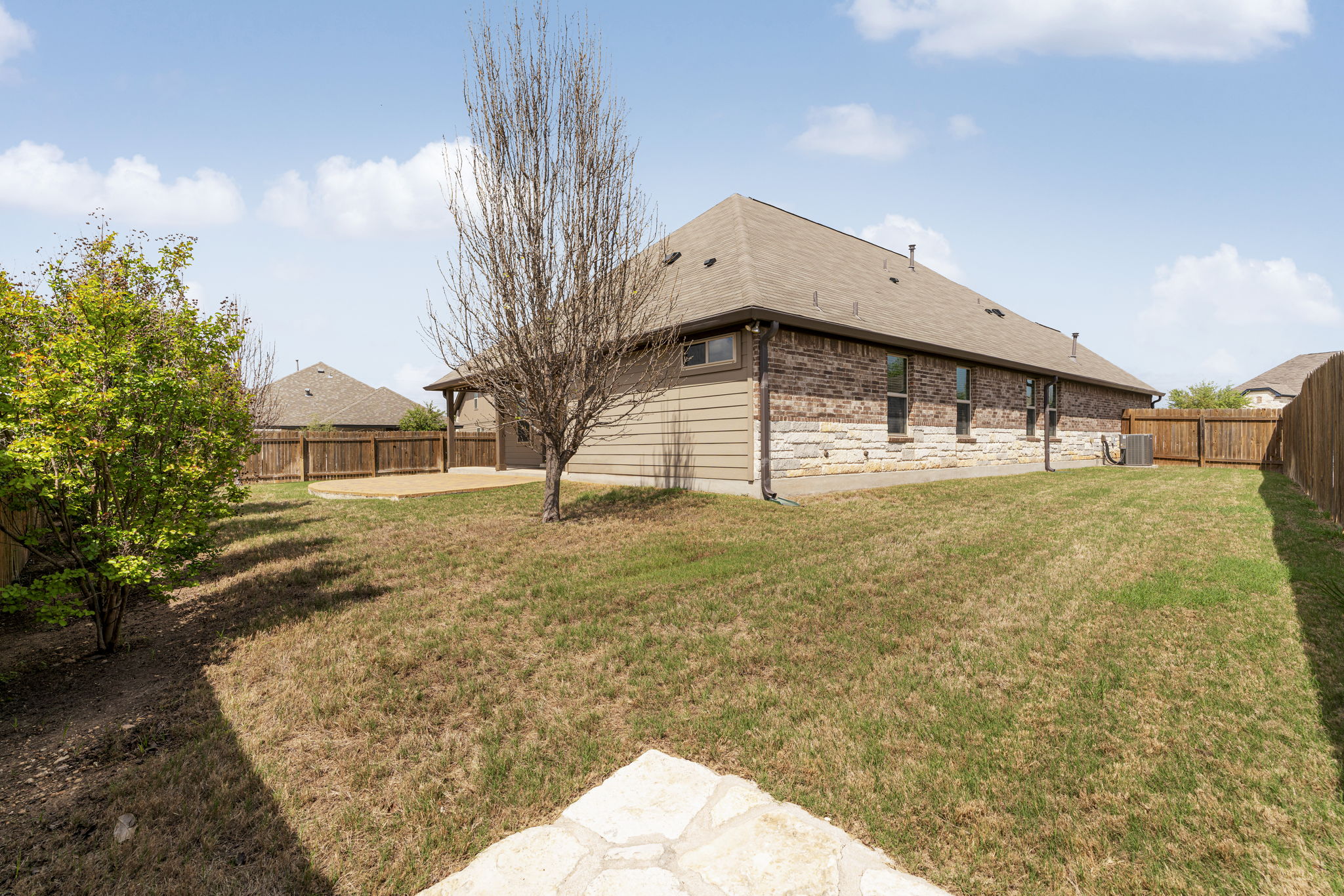 2009 Kates Cove Manchaca, TX 78652 - Photo 19 of 25 a house view with swimming pool