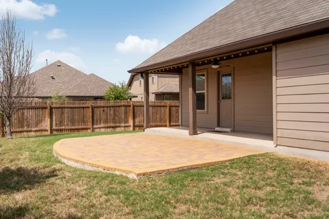 a house with yard in front of it