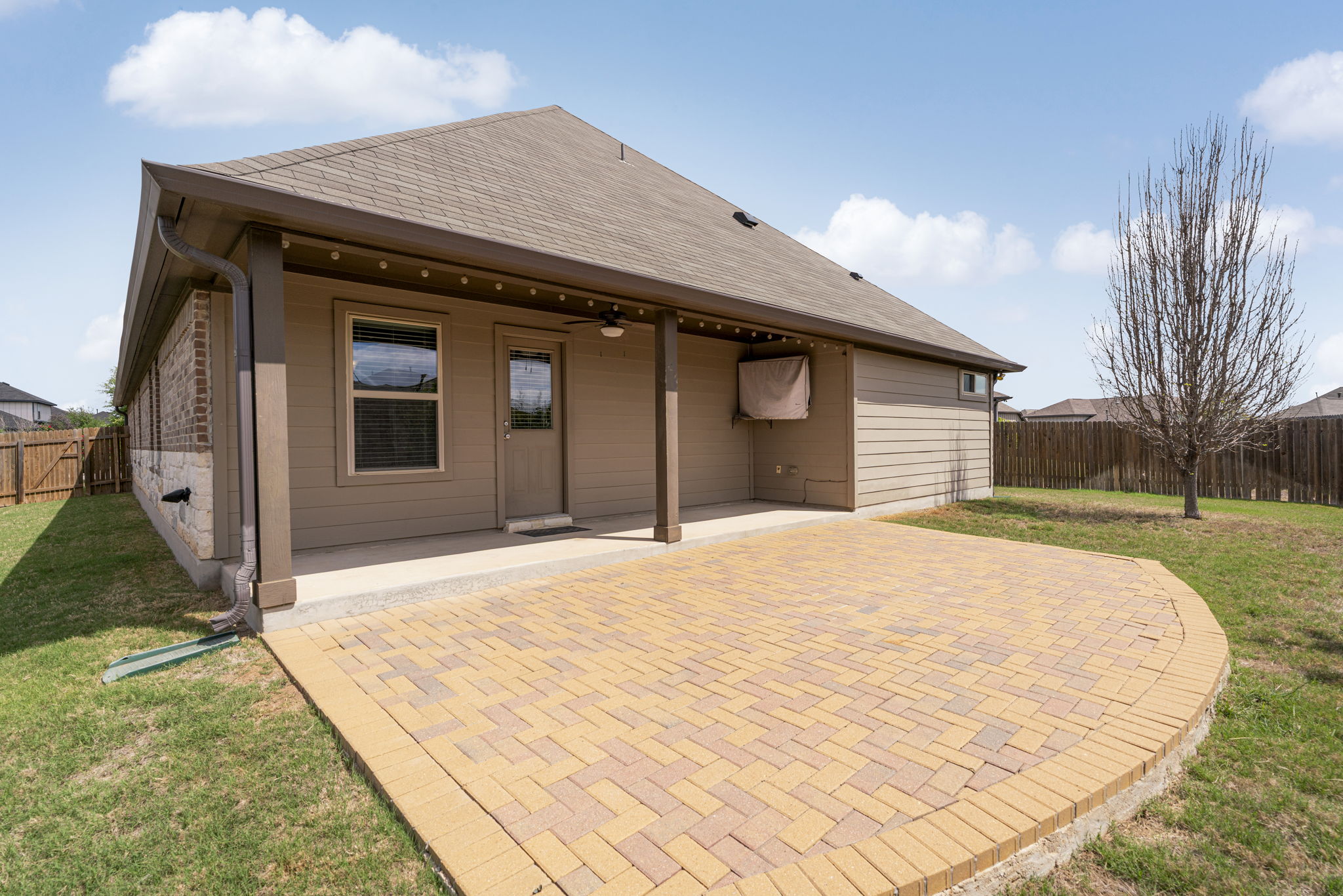 2009 Kates Cove Manchaca, TX 78652 - Photo 22 of 25 a house with yard in front of it