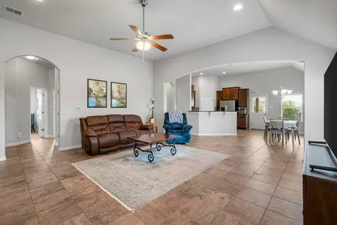 a kitchen with a sink a counter top space and appliances