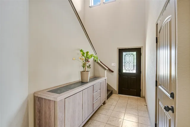 a hallway with cabinets