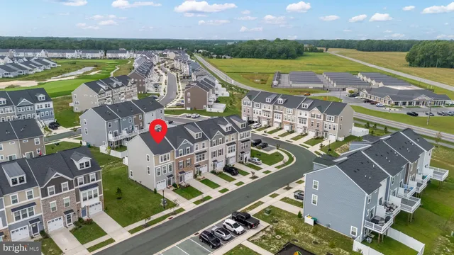 an aerial view of a house with outdoor space swimming pool and outdoor seating