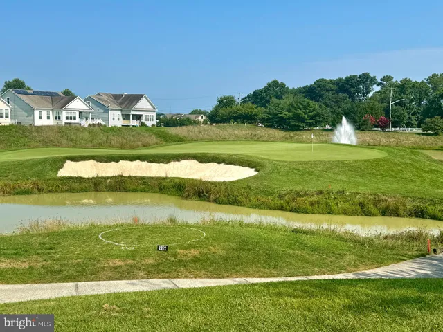 a view of a lake with a big yard
