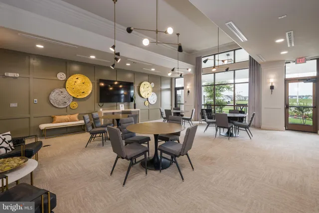 a view of a chairs and tables in a room