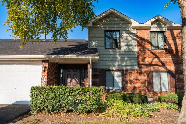 front view of a house with an outdoor space