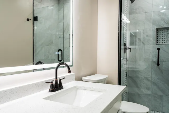 a bathroom with a sink and a toilet