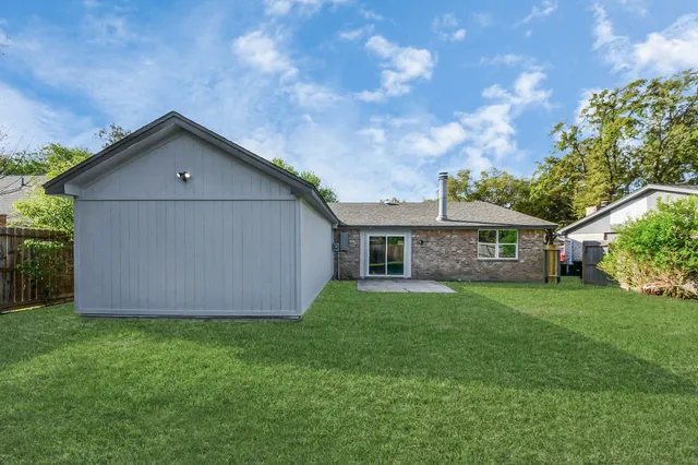 a house view with a garden space