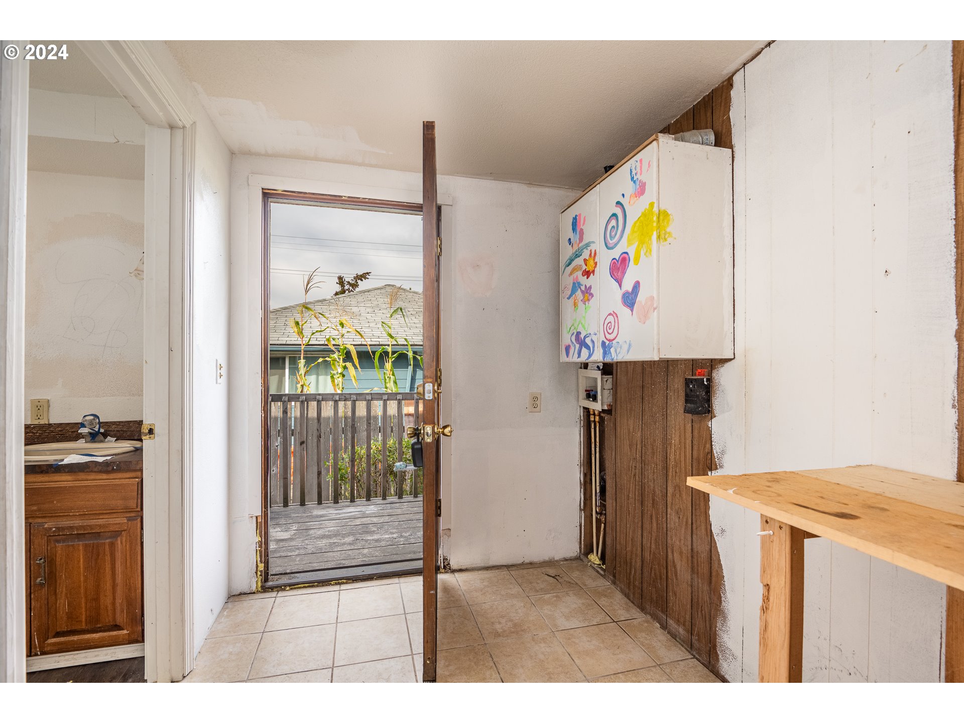 1487 30th Street Springfield, OR 97478 - Photo 26 of 37 a view of an entryway and kitchen view