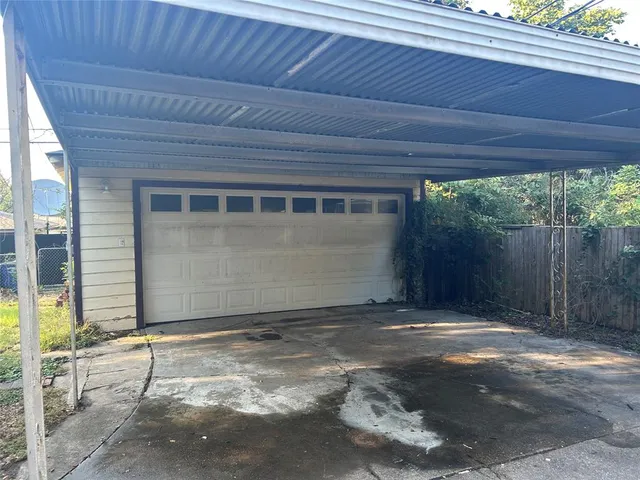 a view of backyard with green space