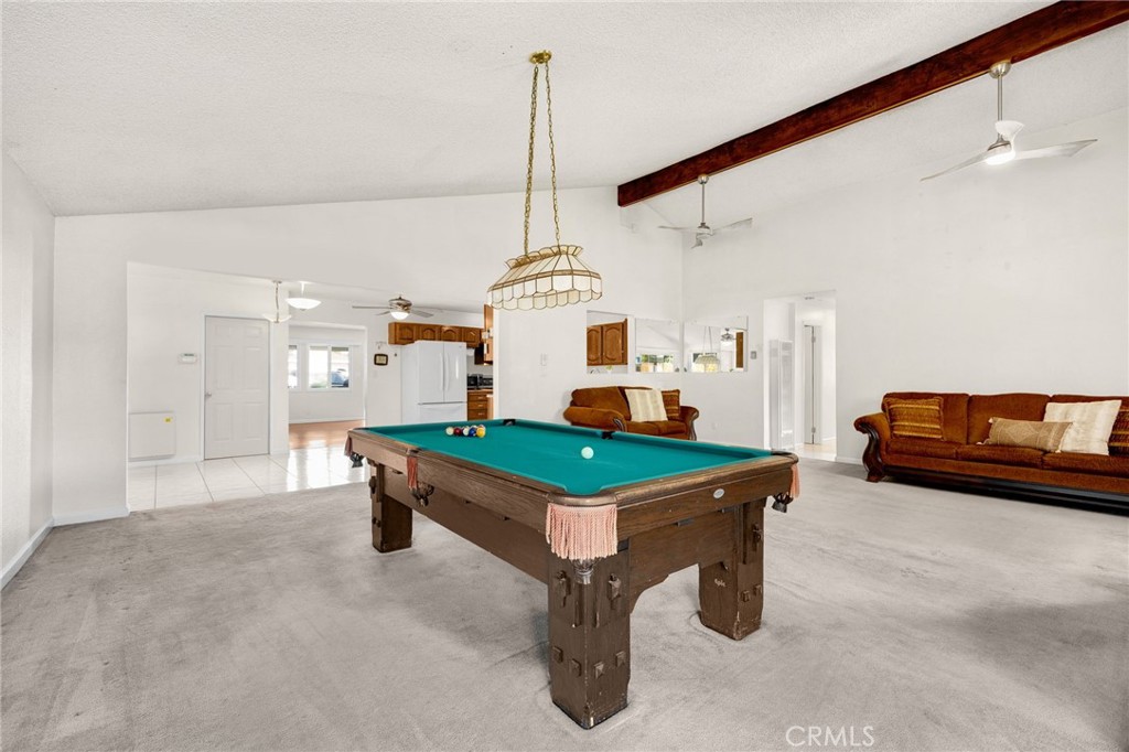 14721 Riata Street Midway City, CA 92655 - Photo 15 of 37 a room with pool table and windows