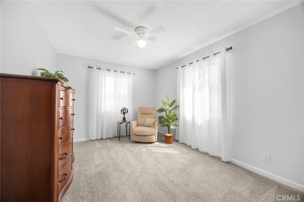 14721 Riata Street Midway City, CA 92655 - Photo 24 of 37 a very nice looking room with a window and a refrigerator