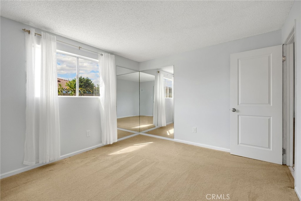 14721 Riata Street Midway City, CA 92655 - Photo 25 of 37 a view of an empty room with a window