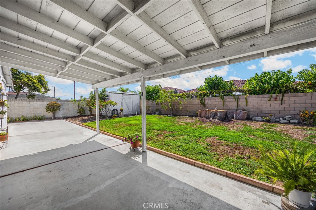14721 Riata Street Midway City, CA 92655 - Photo 29 of 37 a view of a backyard